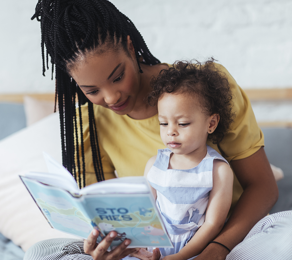 Mom and baby with book